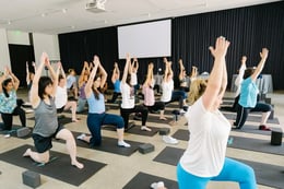 Orbiss team-building yoga session promoting employee wellness.